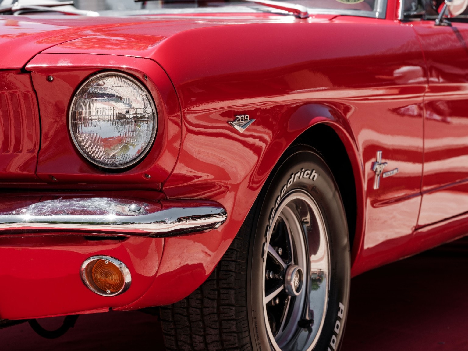 1966 Ford Mustang side panel detail in Kandy Apple Red — historic automotive colour reference for Eclipse designation KK11